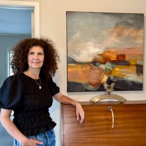 Lyndy Wilson, artist, at the Wharf Gallery, Raglan, 2023